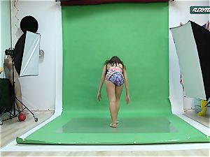 yam-sized funbags Nicole on the green screen stretching